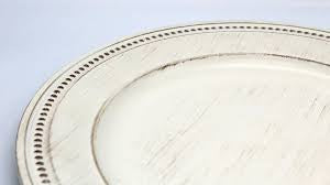 Whitewashed charger plate with beading