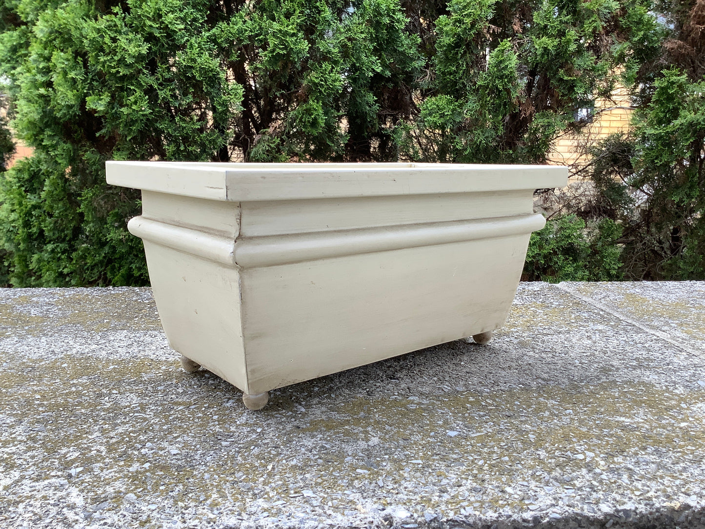Rectangular metal planter with ball feet