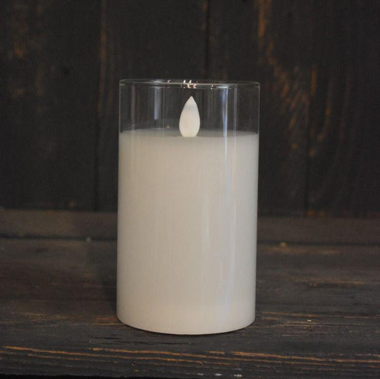 clear glass cylinder moving flame candle