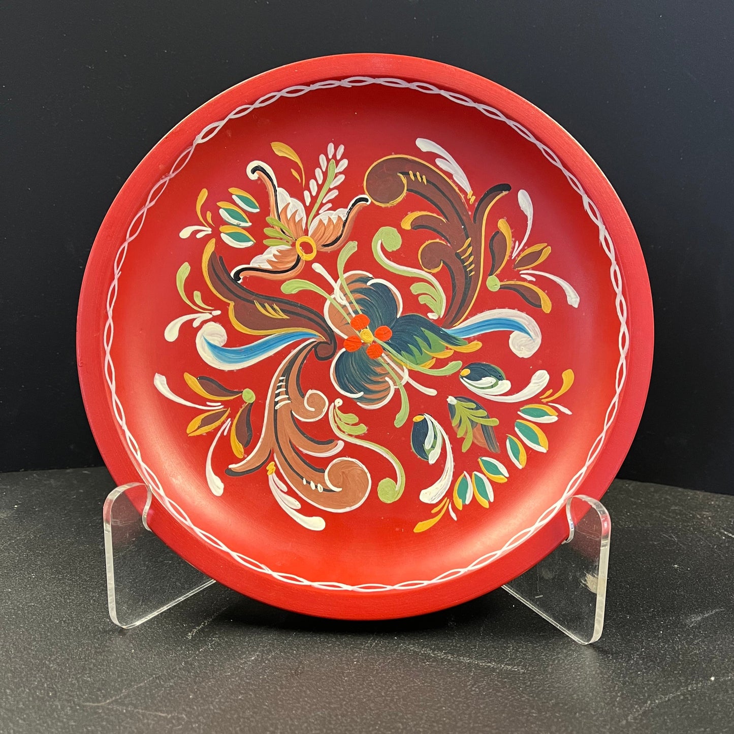 Toll painted wooden plates