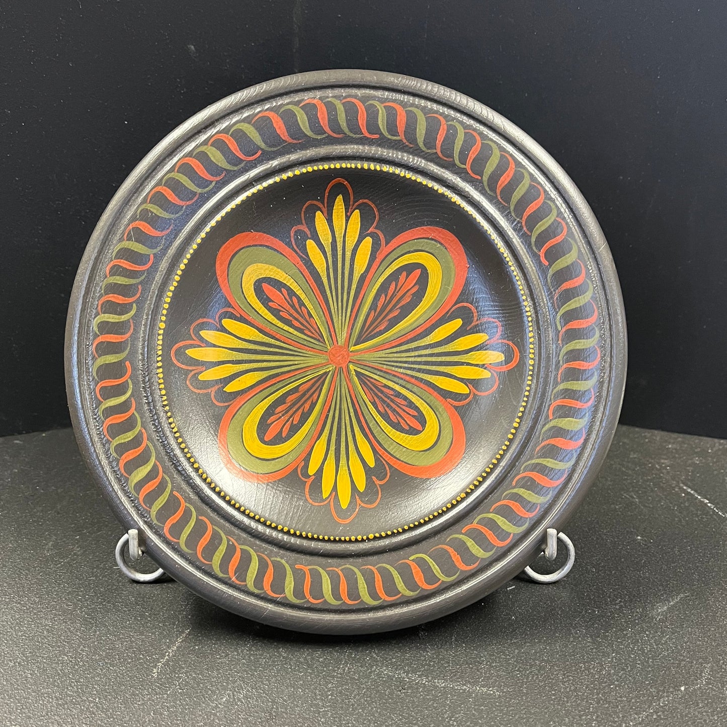 Toll painted wooden plates