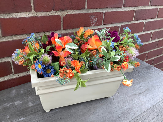 Rectangular metal planter with ball feet