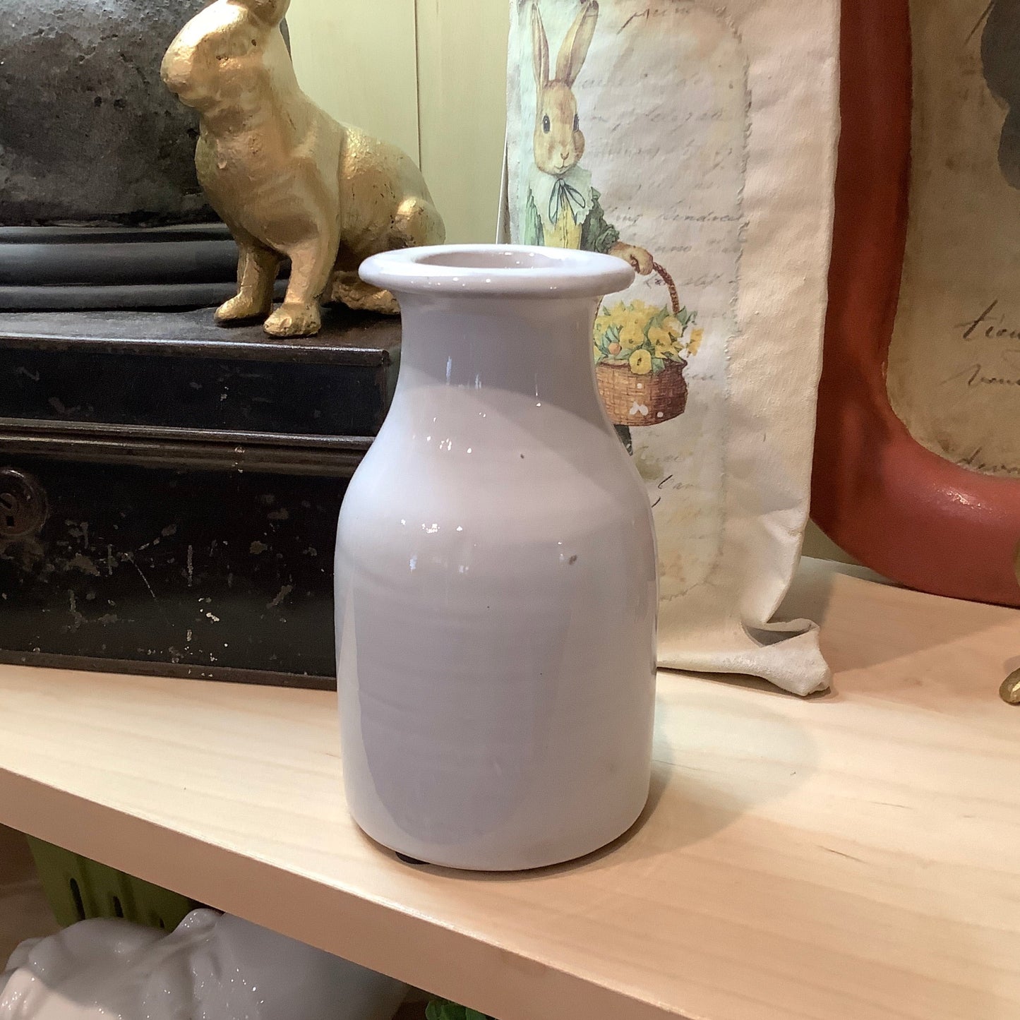 white ceramic bottle vase