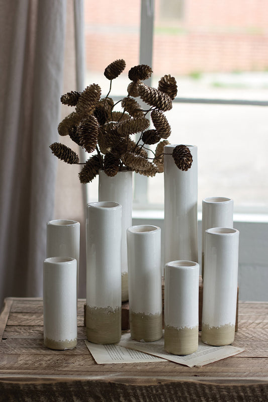 white ceramic cylinder vase