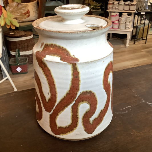 clay lidded jar with cut out lid